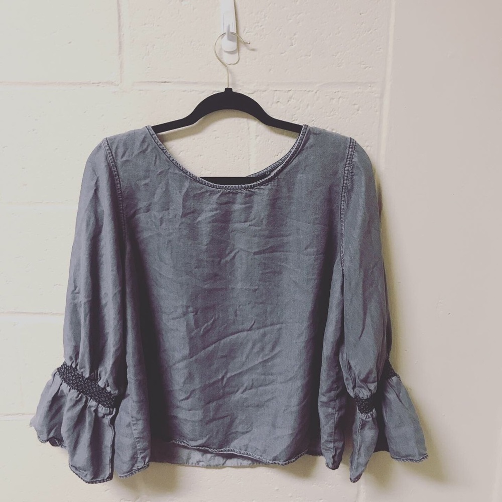 Gray bell sleeve top.